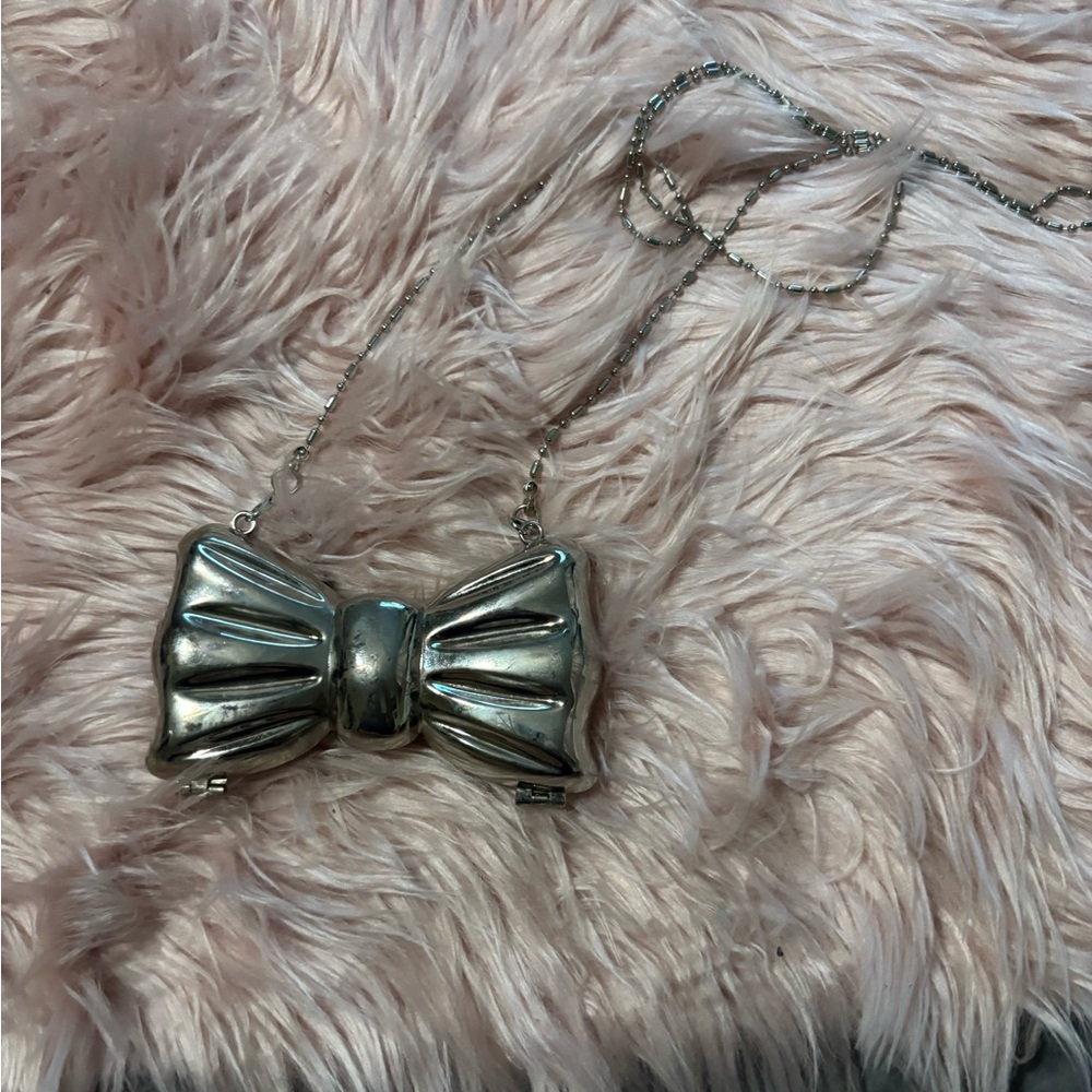 Silver Bow-Shaped Clutch with Chain